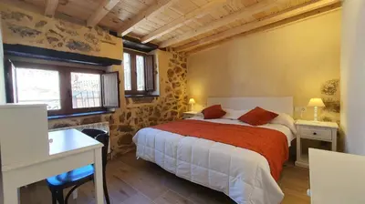 Cama o camas de una habitación en Casas del Castillo, 4