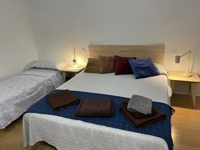 Cama o camas de una habitación en Céntrico acceso independiente laranitasalmantina