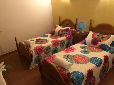 Cama o camas de una habitación en Casa rural Pérez Martín