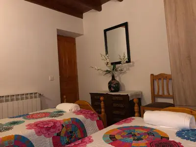 Cama o camas de una habitación en Casa rural Pérez Martín