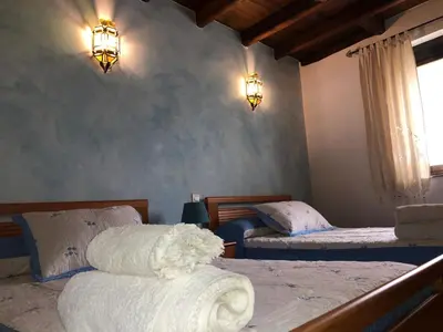 Cama o camas de una habitación en Casa rural Pérez Martín