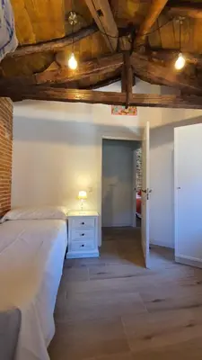 Cama o camas de una habitación en Casas del Castillo, 3