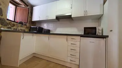 Una cocina o zona de cocina en Casas del Castillo, 3