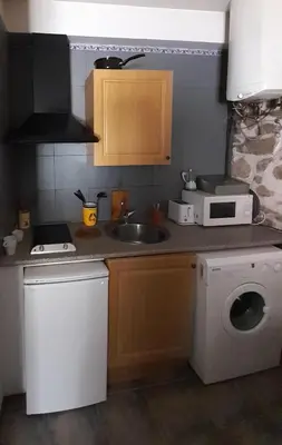 Una cocina o zona de cocina en El Refugio de la lumbre