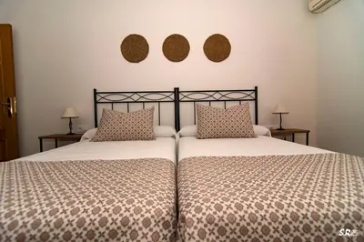 Cama o camas de una habitación en Casa Rural La Molinera Riolobos Caceres