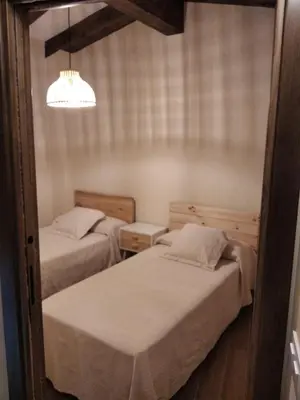 Cama o camas de una habitación en Loboratorio Rural - La Majada del Acebo