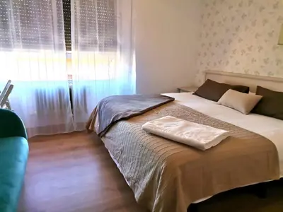 Cama o camas de una habitación en HOTEL LOS ARENALES DE JERTE
