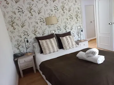 Cama o camas de una habitación en HOTEL LOS ARENALES DE JERTE