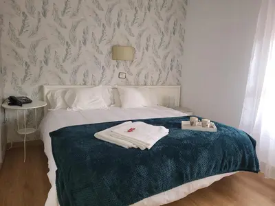 Cama o camas de una habitación en HOTEL LOS ARENALES DE JERTE