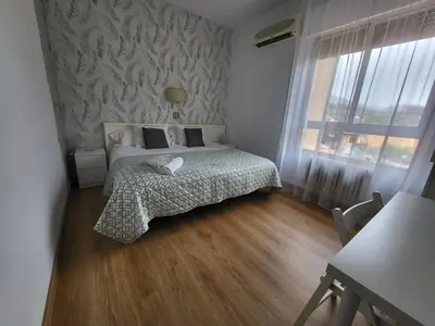 Cama o camas de una habitación en HOTEL LOS ARENALES DE JERTE