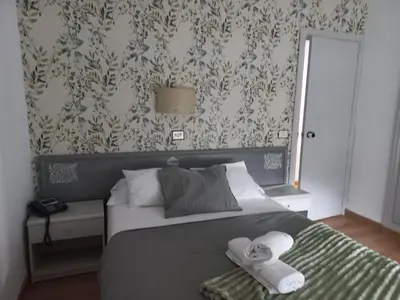 Cama o camas de una habitación en HOTEL LOS ARENALES DE JERTE