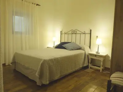 Cama o camas de una habitación en La Serrana de la Vera Casa Rural TR-CC-00366