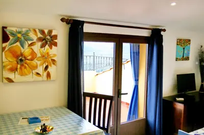 Cama o camas de una habitación en Apartamentos Turisticos Mirayuste