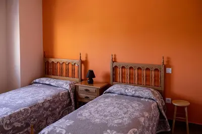 Cama o camas de una habitación en El Gavilán