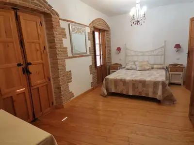 Cama o camas de una habitación en La Aldaba del siglo XX