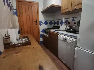 Una cocina o zona de cocina en La Aldaba del siglo XX