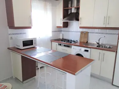 Una cocina o zona de cocina en Acogedor apartamento en EL VALLE DEL JERTE 1