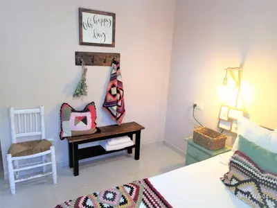 Cama o camas de una habitación en Acogedor apartamento en EL VALLE DEL JERTE 1