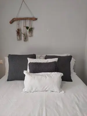 Cama o camas de una habitación en Acogedor apartamento en EL VALLE DEL JERTE 1
