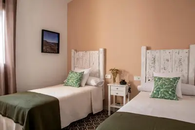 Cama o camas de una habitación en Apartamentos Rurales Helechosa, Las Tres Peñas