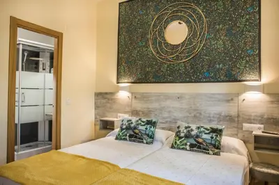 Cama o camas de una habitación en EL ENCANTO DEL ALBERCHE