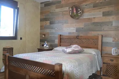 Cama o camas de una habitación en Casa Rural & SPA Mirador Gredos