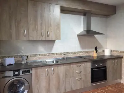 Una cocina o zona de cocina en Alojamientos El Chorro