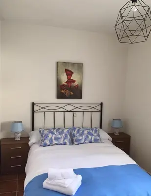 Cama o camas de una habitación en Alojamientos El Chorro