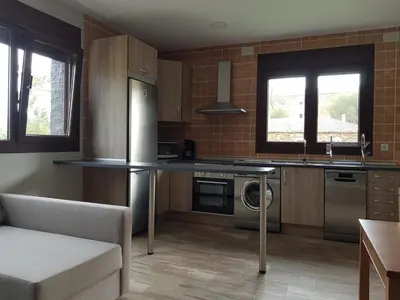 Una cocina o zona de cocina en APARTAMENTOS LOS ÁLAMOS