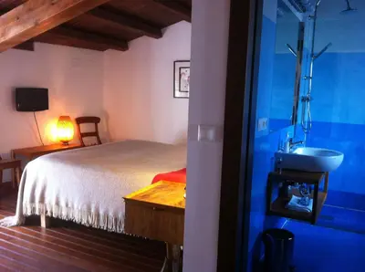 Cama o camas de una habitación en El Baciyelmo