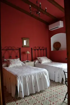 Cama o camas de una habitación en Casa Rural Los Jarales Número Registro TR-CC-00365