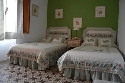 Cama o camas de una habitación en Casa Rural Los Jarales Número Registro TR-CC-00365