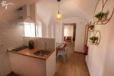 Una cocina o zona de cocina en Apartamentos Turísticos AbrilyMarzo