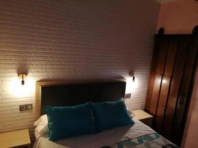 Cama o camas de una habitación en Apartamento Buenavista con Jacuzzi y Jardín privado en Abadia ATT-CC-0608