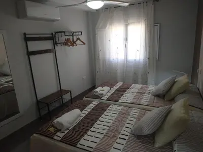 Cama o camas de una habitación en Alqazeres Confort