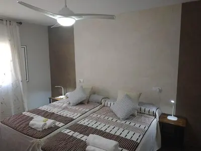 Cama o camas de una habitación en Alqazeres Confort