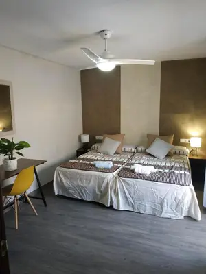 Cama o camas de una habitación en Alqazeres Confort