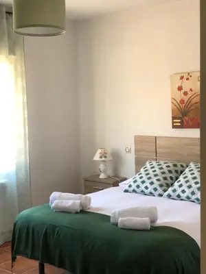 Cama o camas de una habitación en Alojamientos El Chorro