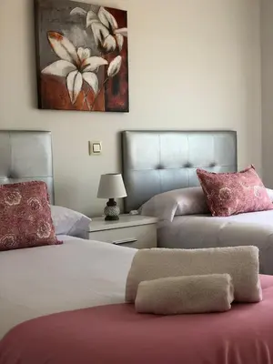 Cama o camas de una habitación en Alojamientos El Chorro