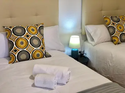 Cama o camas de una habitación en EL MIRADOR DE CACERES