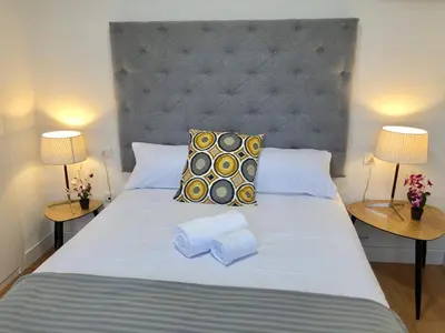 Cama o camas de una habitación en EL MIRADOR DE CACERES