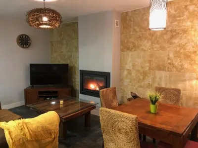 Una televisión o centro de entretenimiento en LUXURY MESTAS