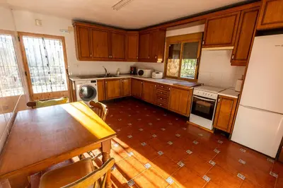 Una cocina o zona de cocina en Casa Rural El Abeto