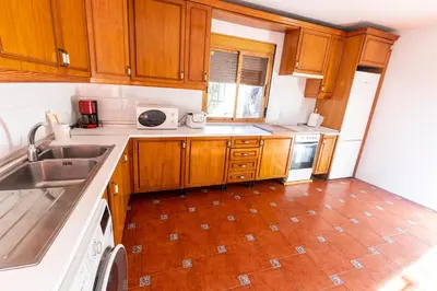 Una cocina o zona de cocina en Casa Rural El Abeto