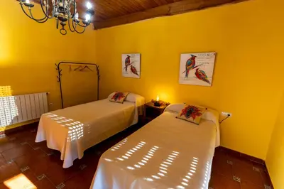 Cama o camas de una habitación en Casa Rural El Abeto