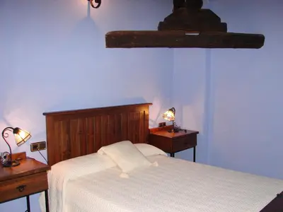 Cama o camas de una habitación en La Boticaria Casa Rural Apartamento