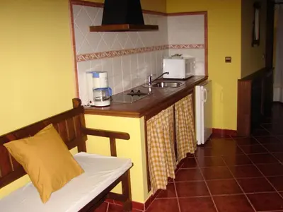 Una cocina o zona de cocina en La Boticaria Casa Rural Apartamento