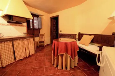 Una cocina o zona de cocina en La Boticaria Casa Rural Apartamento