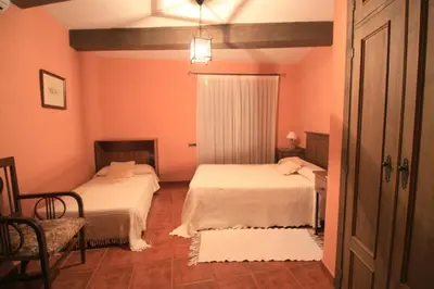 Cama o camas de una habitación en La Boticaria Casa Rural Apartamento