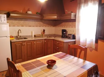Una cocina o zona de cocina en Casa Rural El Olivo